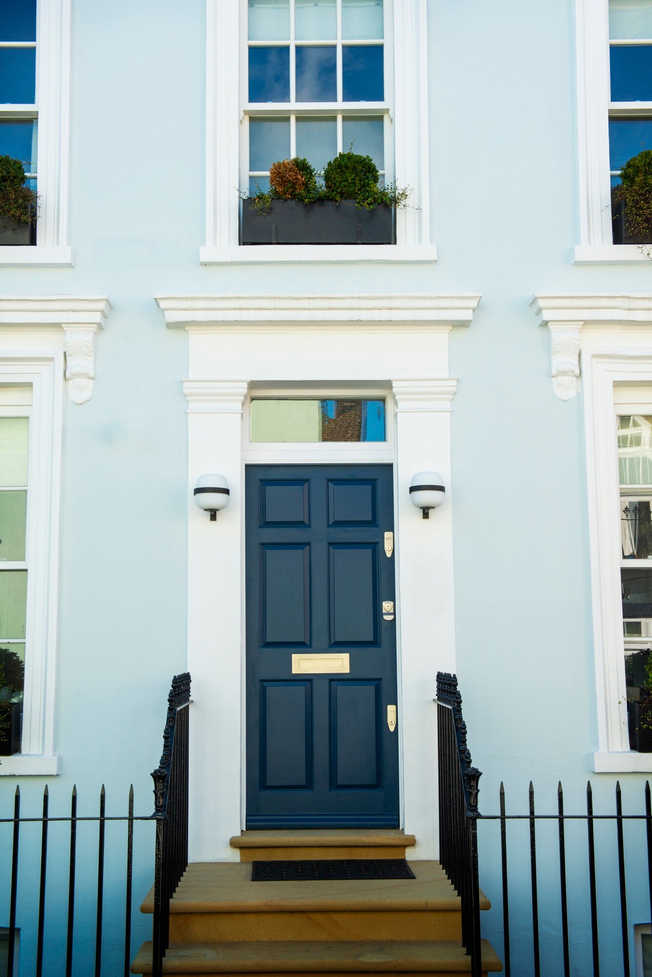front-view-front-door-with-blue-wall_23-2149360647